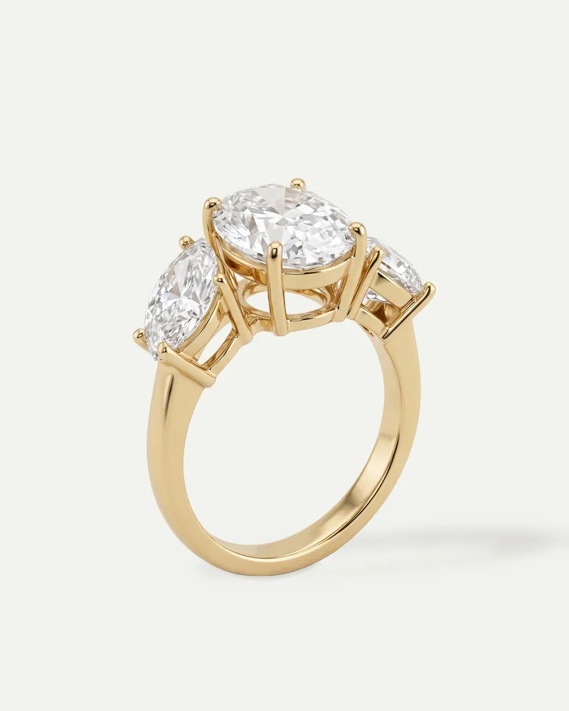 BRG6074, three-stone ring shown in yellow gold